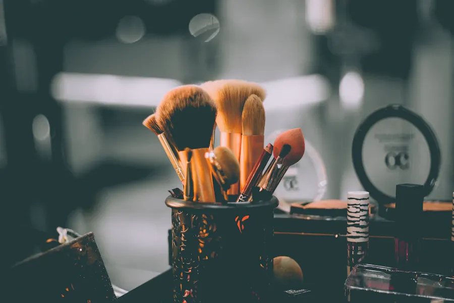 Professional makeup brushes and beauty tools arranged on a vanity