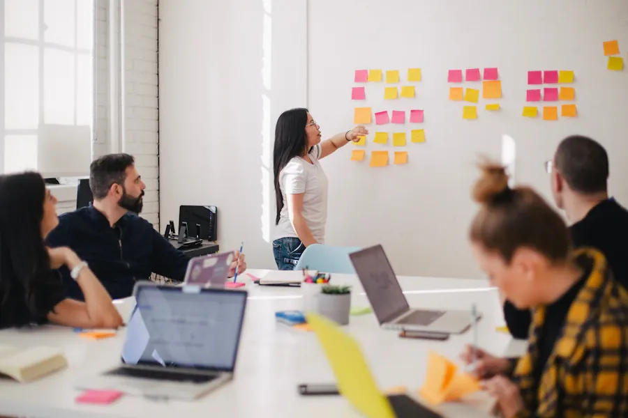 Professionals discussing a project at a meeting table
