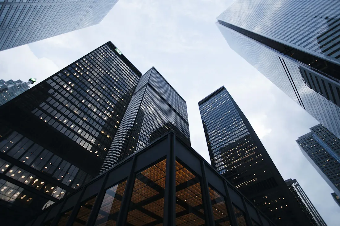Architectural view looking up at a contemporary glass building