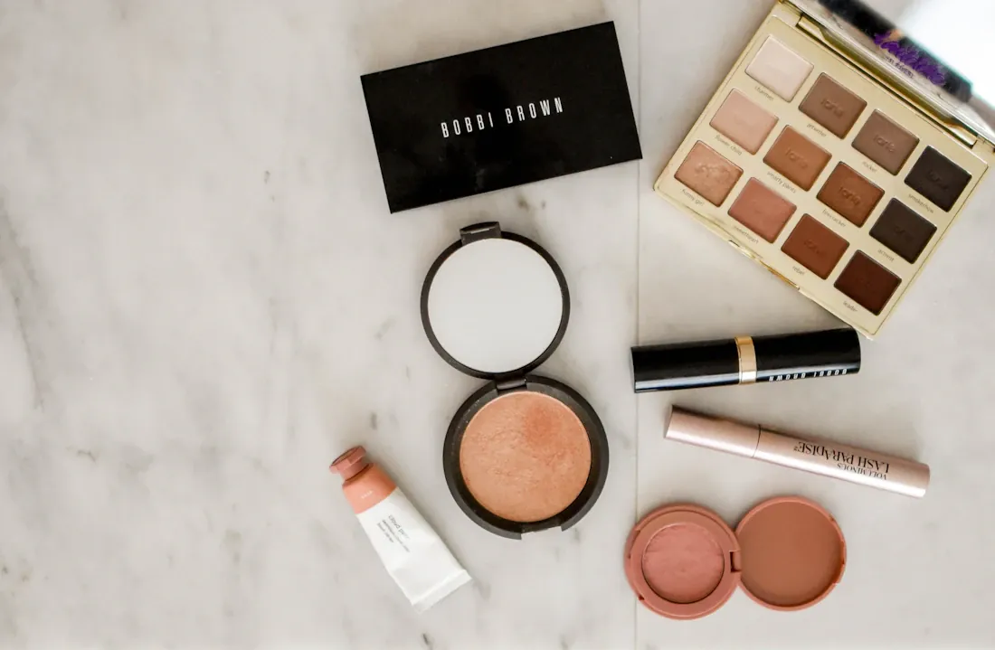 Professional beauty products arranged for a makeup session